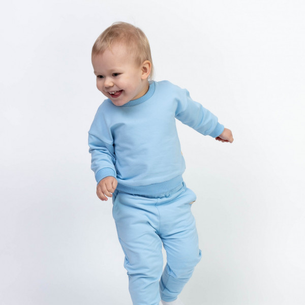 Bawełniana dziecięca bluza dresowa z miękkim meszkiem błękitna 17